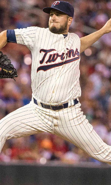 Closer Perkins stays perfect, helps halt Twins' skid